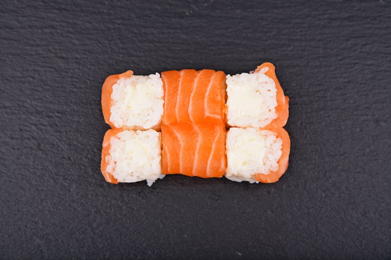 Cream cheese maki rolled up with salmon